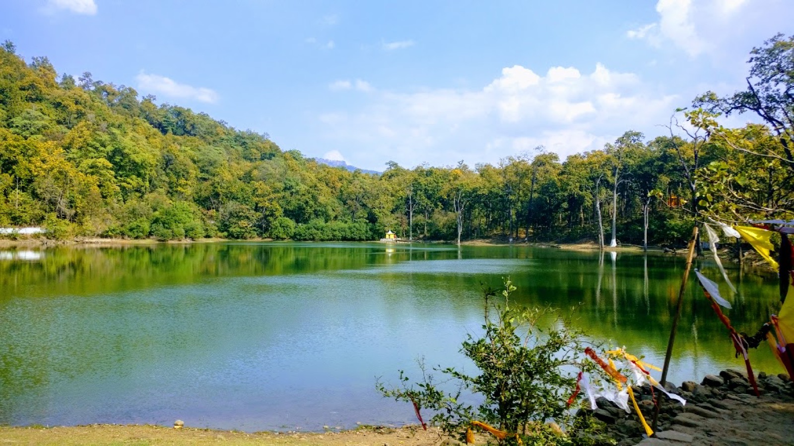 Bedkot Lake in Kanchanpur district, with open water and trees along the shore