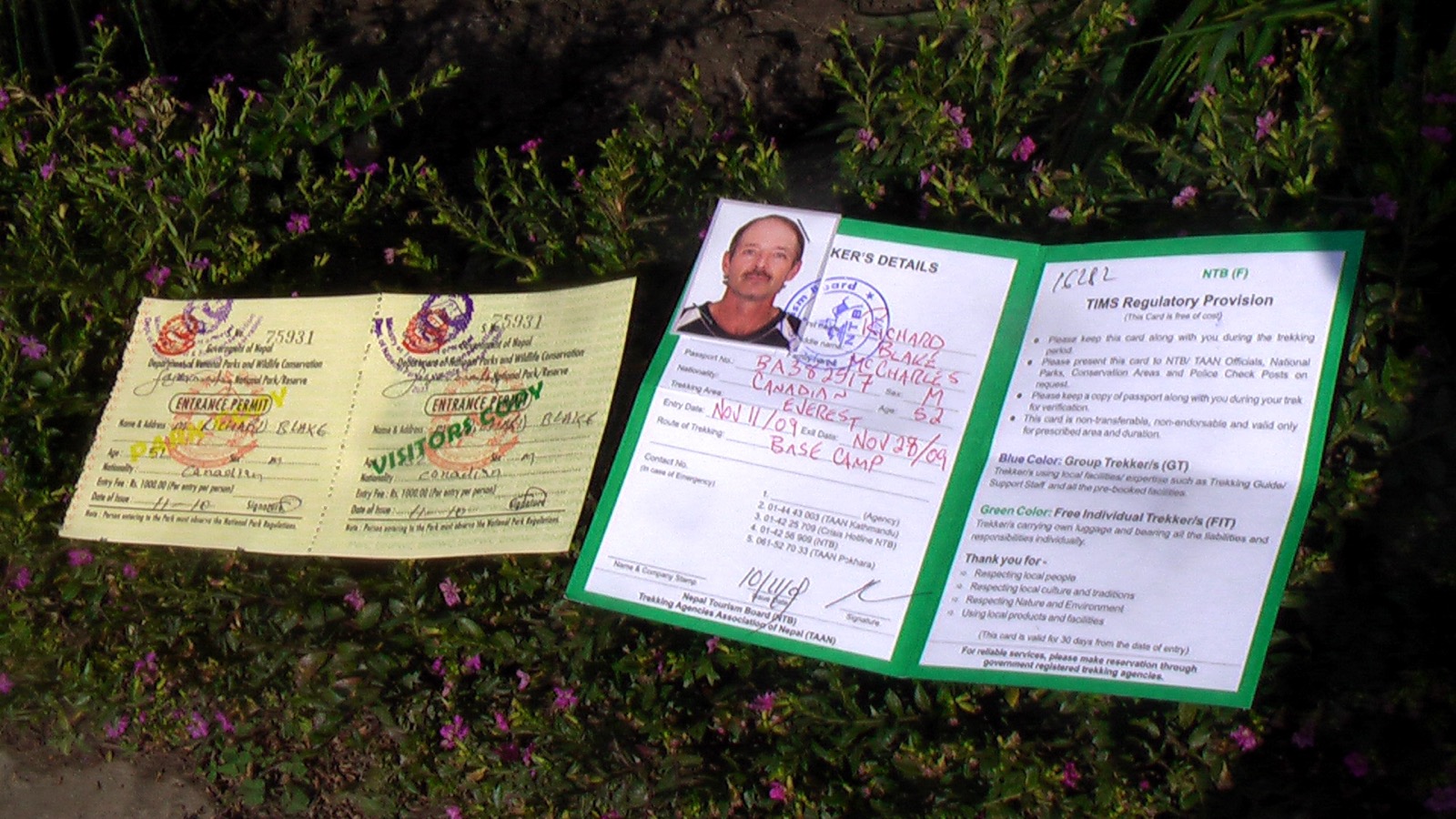 Photo of a Sagarmatha National Park permit and a TIMS card laid out together
